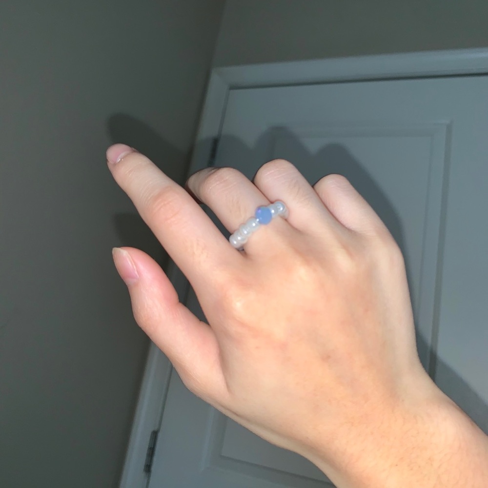 White beaded ring with gem ring